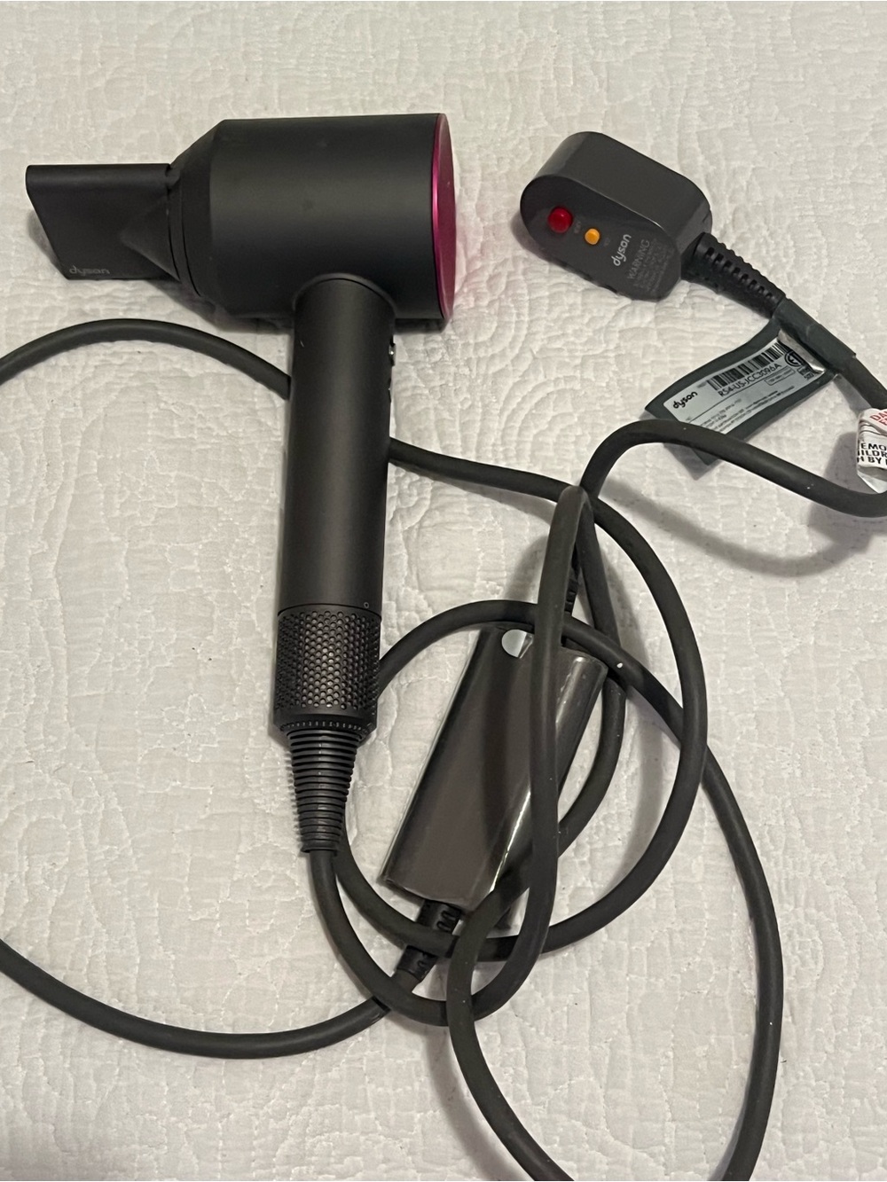 Hair dryer with power cord